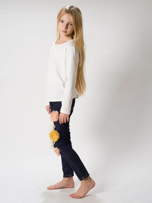 Jeans con applicazioni floreali